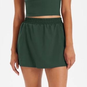 Girlfriend collective RipStop woven skirt. Dark green.